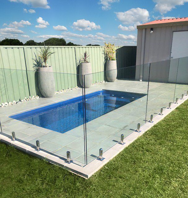 Fibreglass swimming pool by tranquility. The Cleo in colour ocean blue