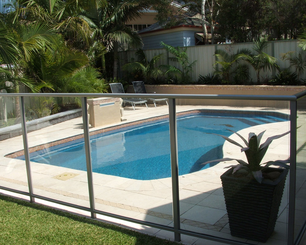 Professional installation of fibreglass swimming pool with beach beds