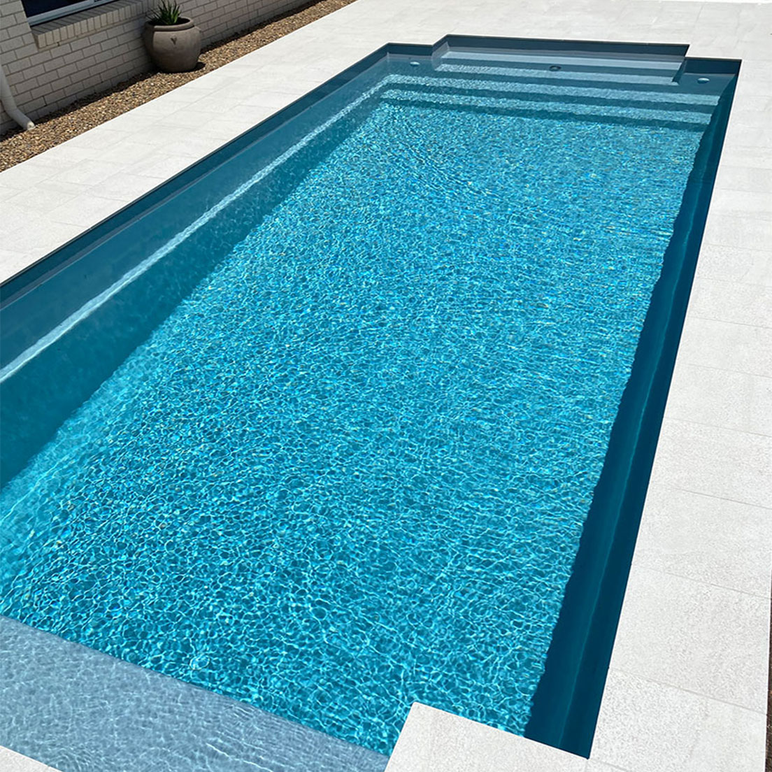 Swimming Pool with White Tiles