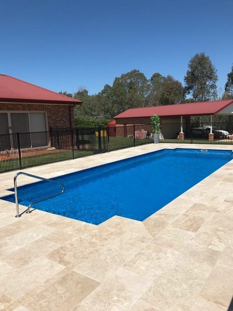 Masterbuilt pool range classic in light blue stone paving